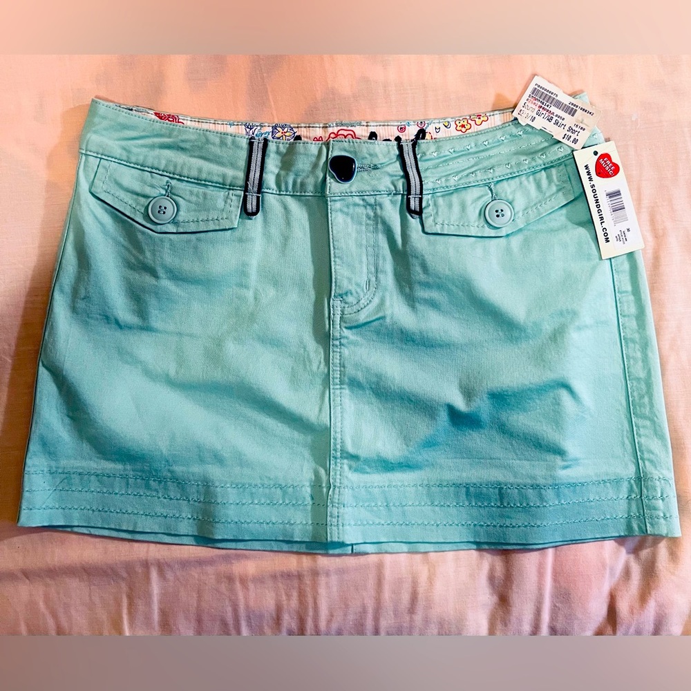 Sound girl mini skirt new very pretty in person, back pockets and front pockets